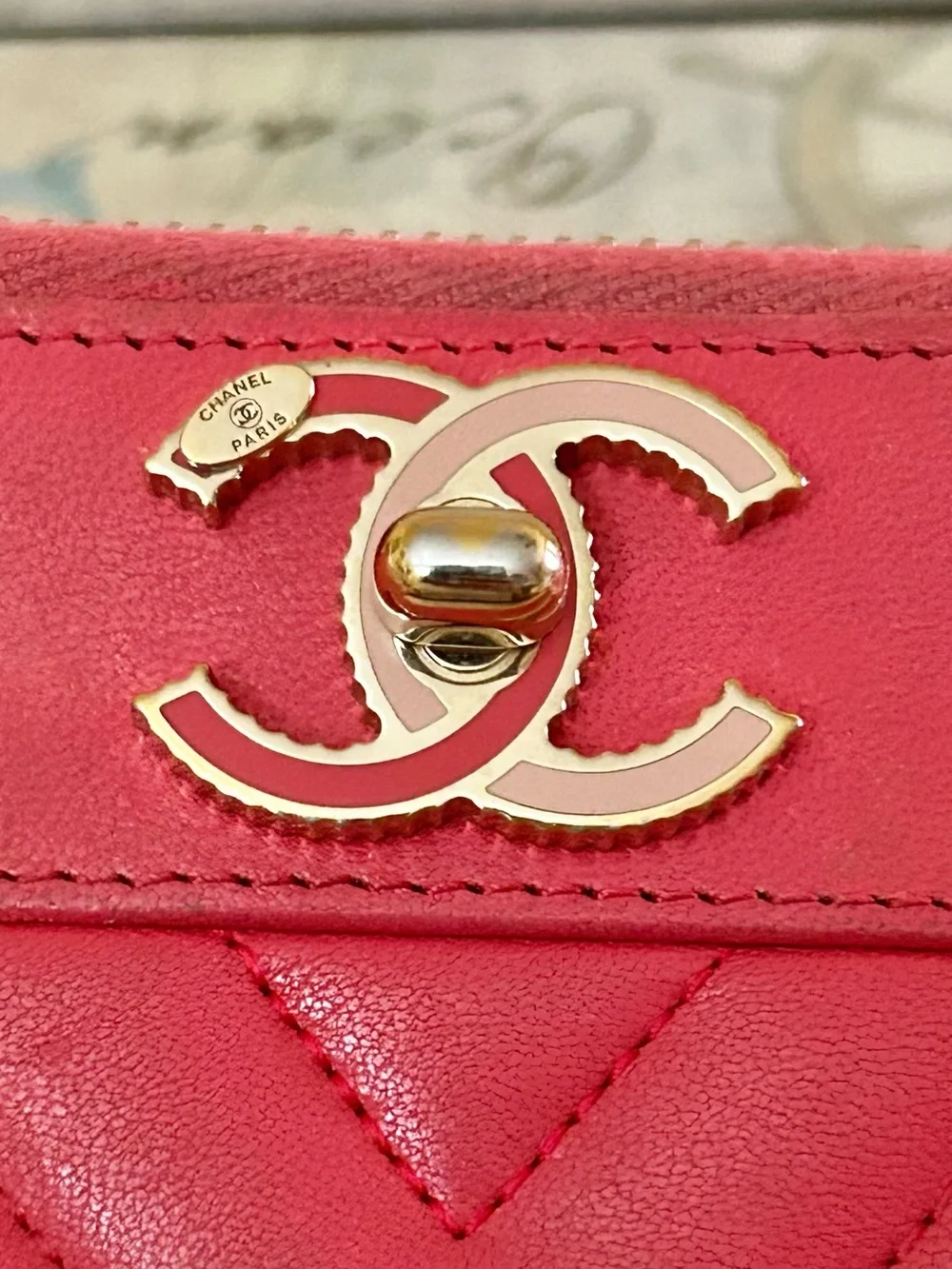 CHANEL Pink/Coral Quilted Chevron Zip Wallet